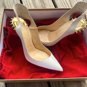 Christian Louboutin size 38. Comes with individual dust bags in original box.